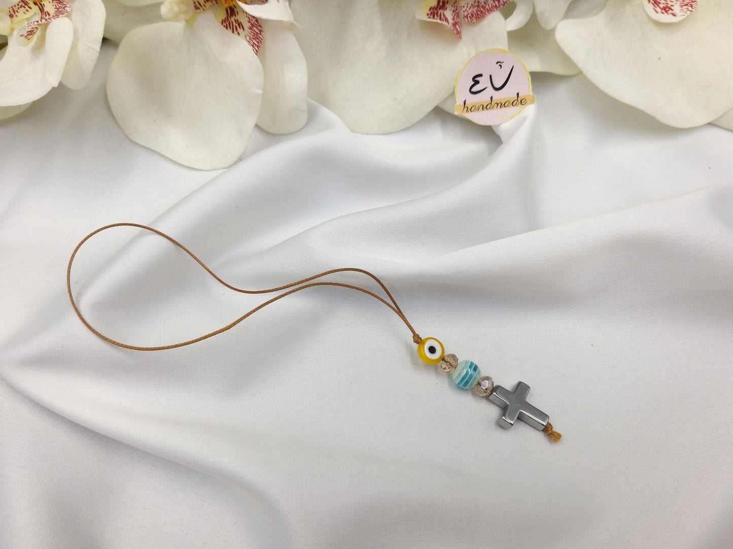 Χειροποίητο γούρι αυτοκινήτου με βαμβακερό κορδόνι, ασημί σταυρό και κίτρινο ματάκι