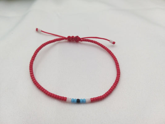 Χειροποίητο βραχιόλι Μάρτη με κόκκινο νήμα και miyuki ματάκι